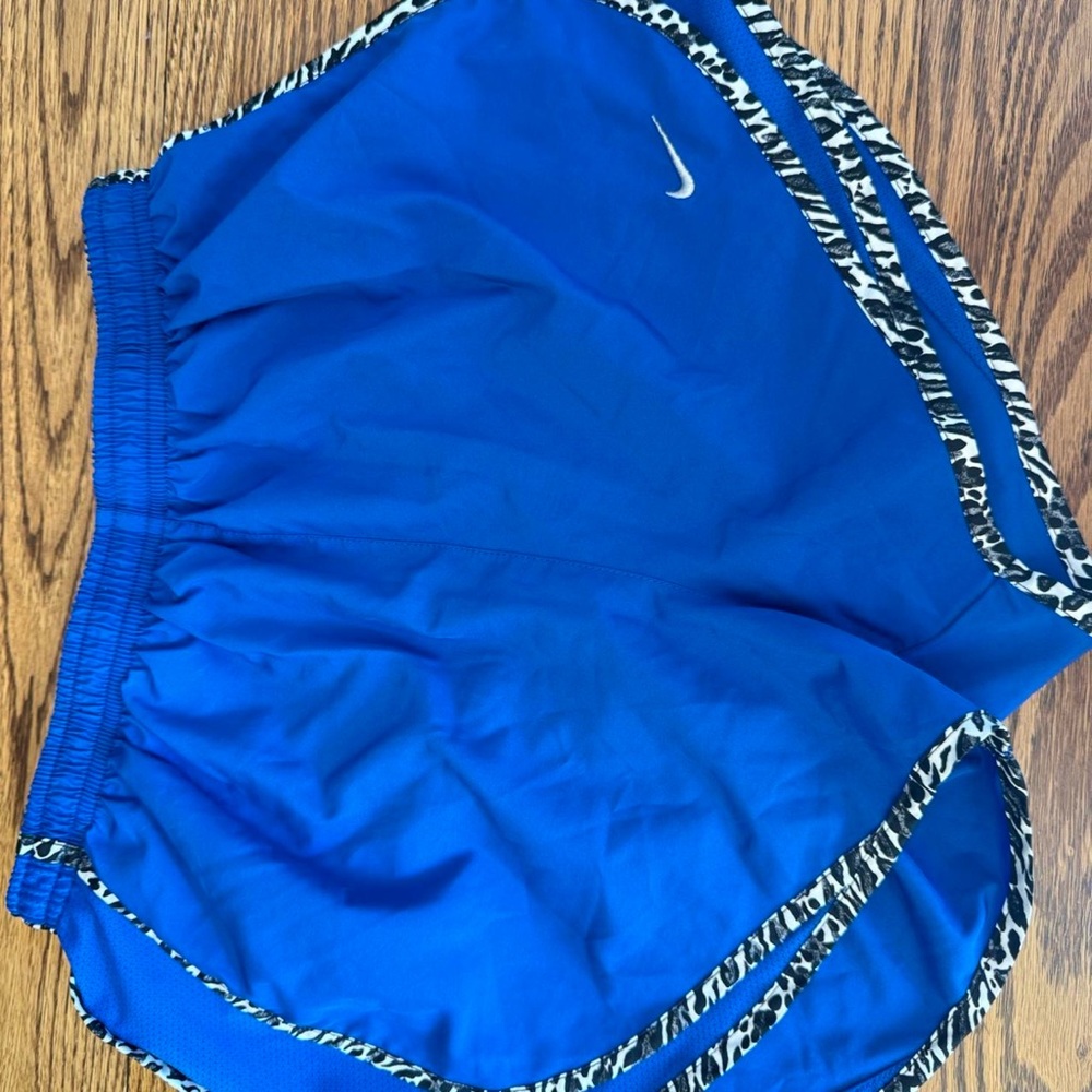 Nike Women's Vibrant Blue Athletic Shorts with Patterned Trim